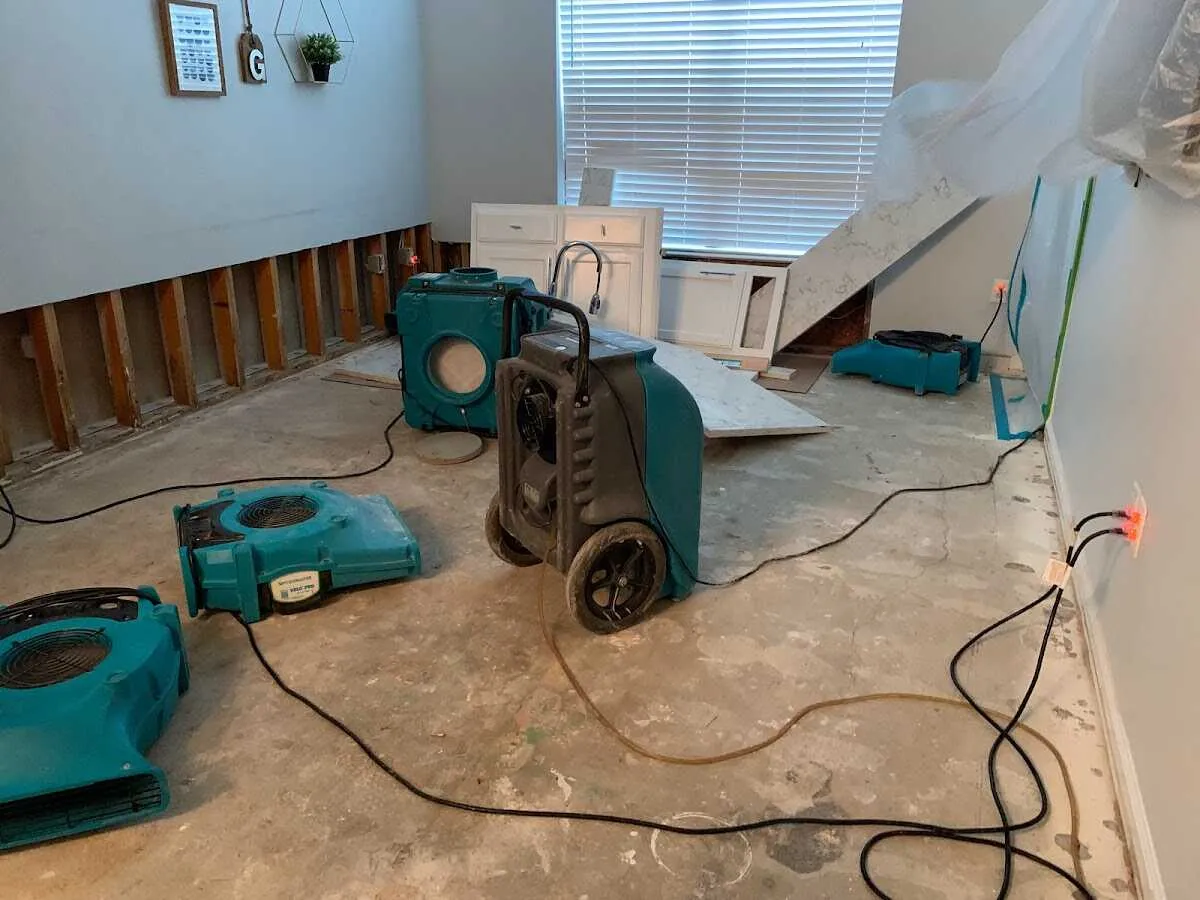 Dehumidifier in flood-cut room for Water Damage Restoration in Dalhart